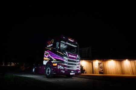 Photo for Dobele, Latvia - August 18, 2023 - Truck illuminated at night, stars, transport, vehicle, modern. - Royalty Free Image