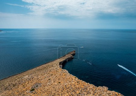 Foto de Island of Comino in Malta on background - Imagen libre de derechos
