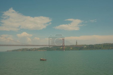 Photo for Lisbon, Portugal - June 02, 2023: Beautiful view of Tagus river with the Lisbon city on background - Royalty Free Image