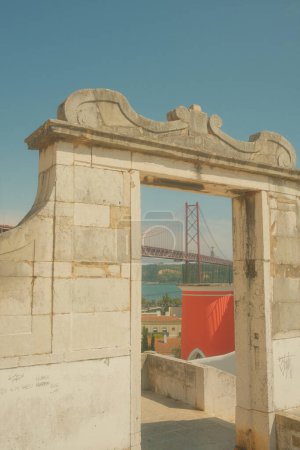 Photo for Vasco da Gama Bridge in frame of old arch building in Lisbon, Portugal - Royalty Free Image