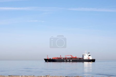 Photo for Liquefied petroleum gas tanker. The ships, basically oil tankers, had been converted by fitting small, riveted, pressure vessels for the carriage of LPG into cargo tank spaces. - Royalty Free Image