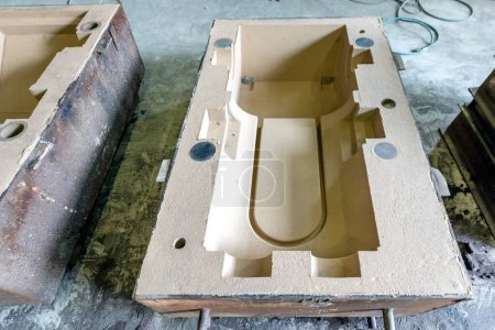 Foto de View of the sand mold casting. Sand casting, also known as sand molded casting, is a metal casting process characterized by using sand as the mold material. - Imagen libre de derechos