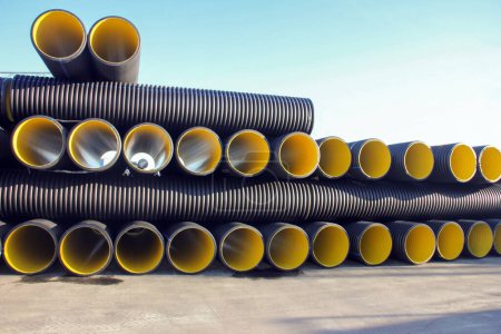 Photo for Corrugated pipes. This pipe used for many years in the leading European countries the US and Japan; having a high compressive strength and are serrated outer tube having rounded appearance. - Royalty Free Image