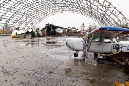 Photo for Hostomel, Ukraine APR 05, 2023 Debris of ukrainian airplane AN-225 Mriya destroyed at Hostomel airfield after russian invasion to Ukrain - Royalty Free Image