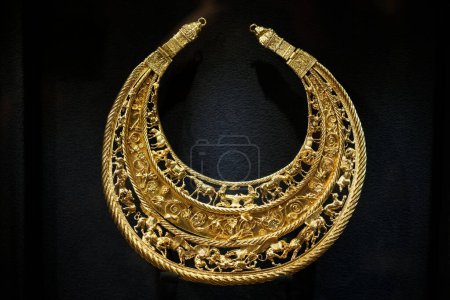 Photo for KYIV, UKRAINE - NOVEMBER 28 2023 Golden Scythian Pectoral from Tovsta Mohyla at the Treasury of the National Museum of History during the presentation of the 'Scythian Gold' collection returned to Ukraine - Royalty Free Image