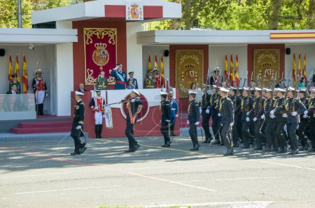 Photo for Marching sailors, some 4,100 military personnel participated during the National Day military parade including King Felipe VI, Queen Letizia, and Princess Leonor, in Madrid Spain.i - Royalty Free Image