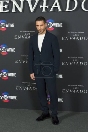 Photo for Miguel Angel Silvestre  posing at the photocall of the SkyShowtime original series, Los Enviados, during the media event at the Hotel Urso, Madrid Spain January 24th 2024 - Royalty Free Image