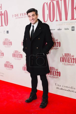 Photo for Luis Larrodera seen posing during the premiere of the Spanish comedy film The queen of the Convent at the Cine Callao in Madrid Spain. - Royalty Free Image