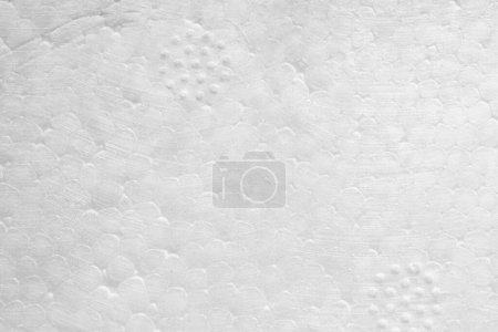 Photo for Close-up view of white expanded polystyrene (PS) plastic foam. Used for food or electronic packaging, or insulation of buildings. - Royalty Free Image
