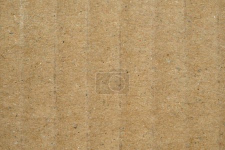Photo for High-res photo of brown blank cardboard from a box with slight stripes, useful as a background, slightly corrugated, looks like from a recycled paper - Royalty Free Image