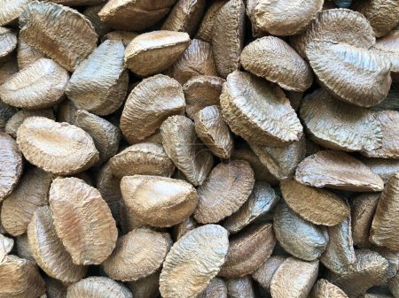 Brazilian nut. Close-up of a group of Brazil nuts as a background. Food background. Biological food.