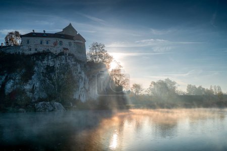 Foggy morning near Krakow, Tyniec, Poland. In the photo, the river and Benedictine Abbey in Tyniec.