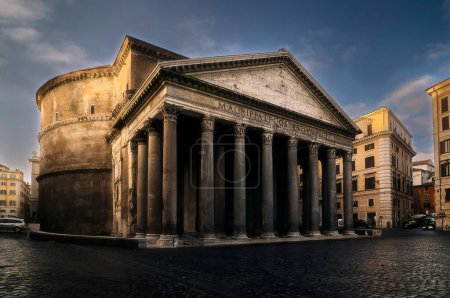 View of the Pantheon of Rome at down with nobody on the photo and the light of the morning sun