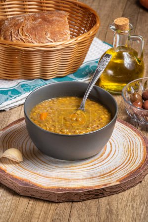 Photo for Fakes a traditional Greek vegetarian soup made from brown lentils - Royalty Free Image