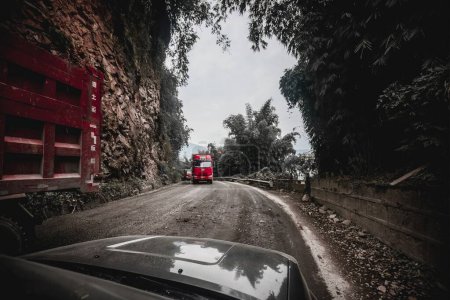 Photo for The mountainous road under construction in western Sichuan, China is very steep - Royalty Free Image