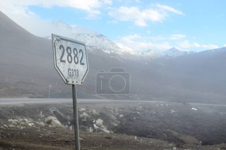 Photo for The mountainous road under construction in western Sichuan, China is very steep - Royalty Free Image