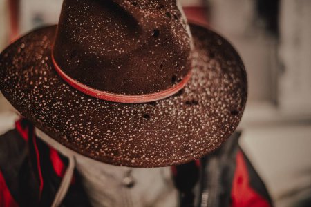 Photo for Snowflakes on the felt cowboy hat of Chinese Tibetans - Royalty Free Image