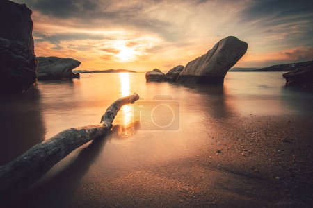 Photo for Beach in Greece, bay in the sunset, holidays by the sea, romanti - Royalty Free Image