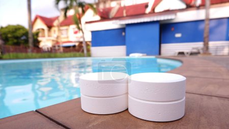 Photo for Chlorine tablets for swimming pools, chemicals for water maintenance in the pool. - Royalty Free Image
