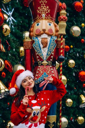 Photo for Happy New Year. Christmas. Christmas tree. hristmas girl. Snow Maiden. New Year's caramels. New Year gifts. Santa. Santa Claus. - Royalty Free Image