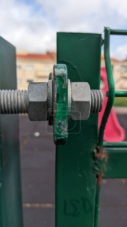 Photo for A gate is clamped between two bolts, the gate is the entrance to the courtyard - Royalty Free Image