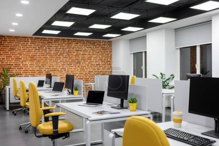 It office with workplaces for employees . High quality photo. Computer for coding software. 