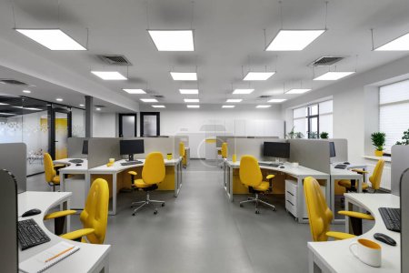 It office with workplaces for employees . High quality photo. Computer for coding software. 
