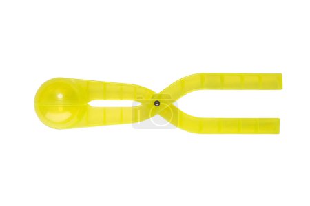 Téléchargez les photos : Fabricant de boules de neige en plastique transparent jaune pour le plaisir d'hiver et les jeux pendant les vacances - en image libre de droit