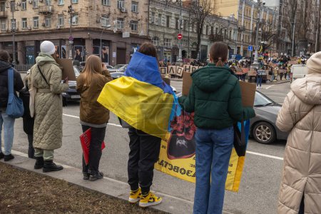 Photo for Kyiv, Ukraine - February 4, 2024. Relatives and friends with placards gathered in the center on Khreshchatyk to honor the fighters of "Azovstal", who have been in Russian captivity for almost two years. everyone is waiting for their return - Royalty Free Image