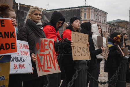 Photo for Kyiv, Ukraine. February 24, 2024. Caregivers and relatives came to the city center with posters calling for the return of prisoners of war who have been held captive by the russians for almost two years - Royalty Free Image