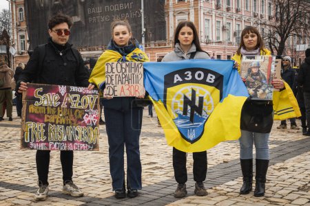 Photo for Kyiv, Ukraine. February 24, 2024. Caregivers and relatives came to the city center with posters calling for the return of prisoners of war who have been held captive by russians for almost two years - Royalty Free Image