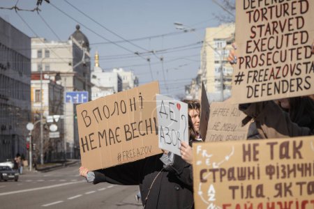 Photo for Kyiv, Ukraine. March 10, 2024. many young, caring people go to the city center during the day to remind all people and countries that the military of "Azov" has been in captivity for two years - Royalty Free Image