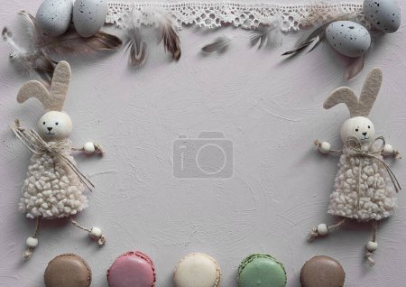 Photo for Easter card with decoration. Easter egg , easter bunny and macaroons cookies on background with frame for wishes. Copy space and flat lay. - Royalty Free Image