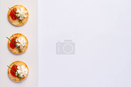 Photo for Food photography of starter with caviar, cream, chive, snack, seafood - Royalty Free Image