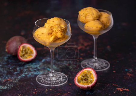 Photo for Food photography of passion fruit and mango ice cream, sorbet, chia, frozen,  cool, scoop, glass - Royalty Free Image