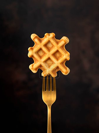 Photo for Macro food photography of waffle on a fork, breakfast, belgian, snack, dessert, sweet, crispy - Royalty Free Image