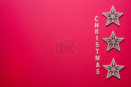 Foto de Fotografía de fondo rojo de estrellas de Navidad - Imagen libre de derechos