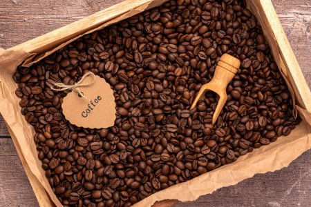 Photo for Background photography of coffee beans, scoop, box, label - Royalty Free Image