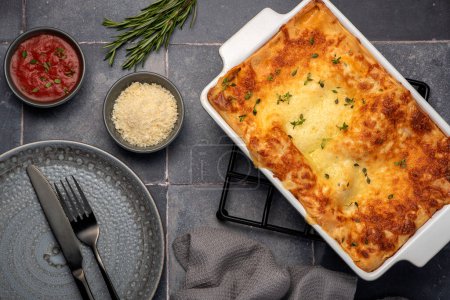 Photo for Food photography of lasagna, cheese, tomato, sauce, parmesan - Royalty Free Image