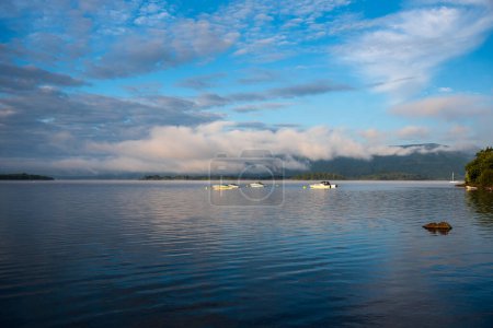 Photo for Landscape photography of lake, morning, boat, cloud, sky - Royalty Free Image