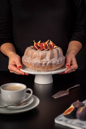 Photo for Food photography of cupcake, cake with figs, icing, cappuccino, coffee, pastry, dessert, woman - Royalty Free Image