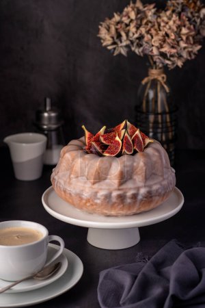 Photo for Food photography of cupcake, cake with figs, icing, cappuccino, coffee, pastry, dessert - Royalty Free Image