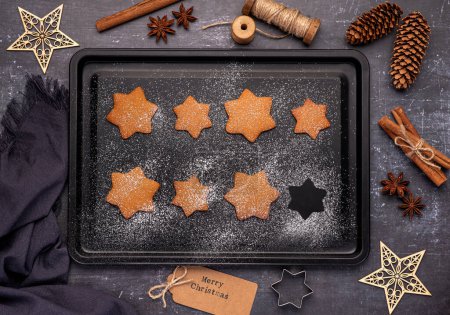 Photo for Food photography of gingerbread, cookies, biscuits, icing sugar, cooking, preparation, cinnamon, anise, background, christmas - Royalty Free Image
