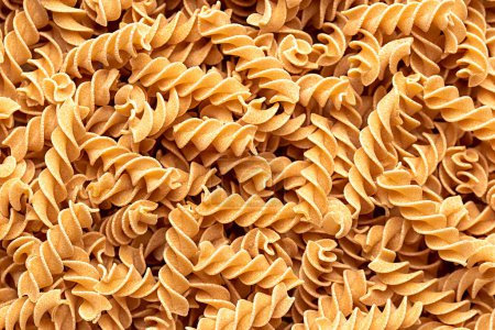 Photo for Macro blank photography of raw chickpea pasta, fusilli, macaroni, gluten free, spiral, raw, italian, traditional, vegetarian - Royalty Free Image