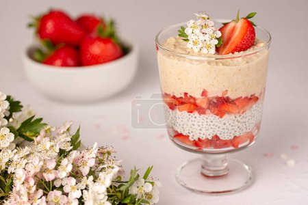 Photo for Food photography of oatmeal, oat, chia seeds pudding, strawberry, mint, yogurt, detox, energy, nutrient - Royalty Free Image