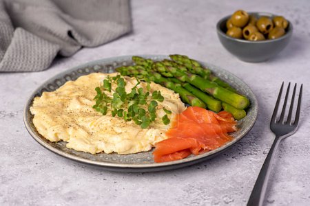 Photo for Food photography of breakfast, scrambled egg,  brunch, omelet, smoked salmon, asparagus, olive - Royalty Free Image