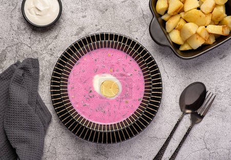 Photo for Food photography of cold beetroot soup, borscht, dill, boiled egg, kefir, yogurt, cream, fried, potatoes, vegetable, healthy, dish, summer - Royalty Free Image