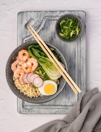Photo for Food photography of soup ramen, boiled egg, onion, shrimp, noodle, prawn, miso, seafood, chinese, japanese, dish, bowl, chopstick - Royalty Free Image