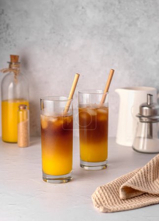 Photo for Food photography of Coffee; bumblebee; orange; juice; iced; drink; beverage; refreshment; sugar; straw; cool; freshness; - Royalty Free Image