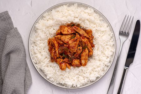 Photo for Food photography of rice, basmati, chicken, stew, casserole, savoury food, curry, tomato, sauce, homemade, asian, spicy, meat - Royalty Free Image